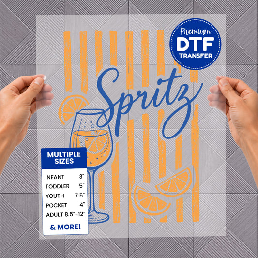 "Spritz" DTF transfer with orange stripes and fruit slices, available in multiple sizes.